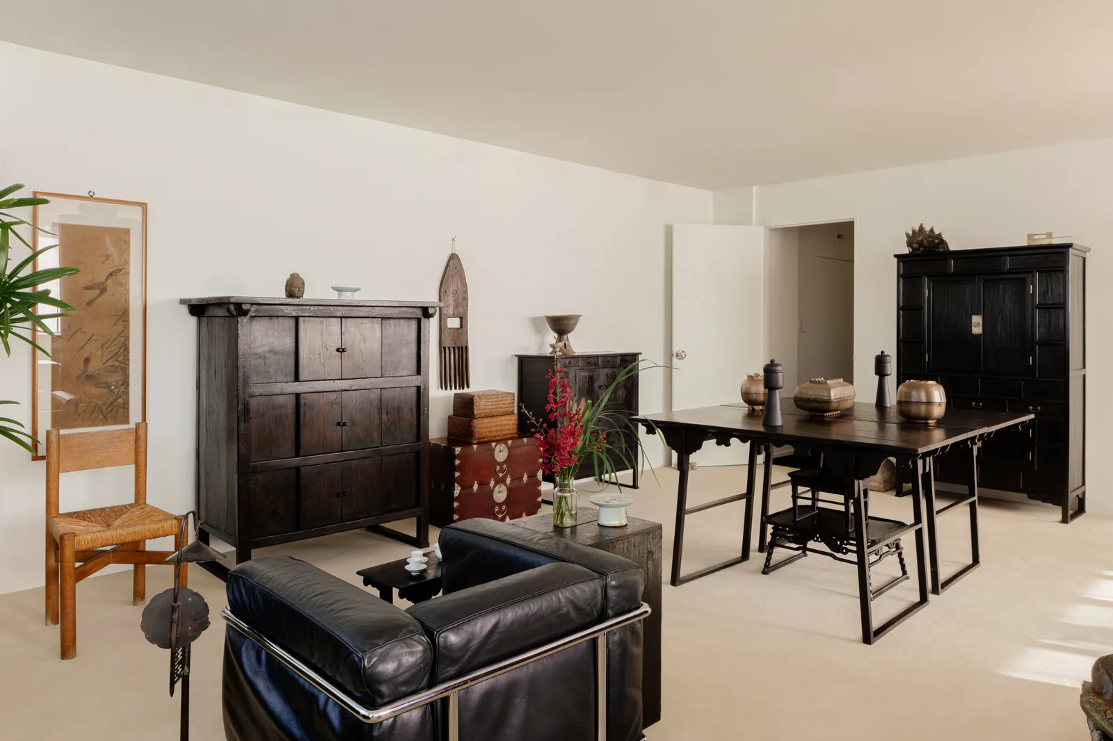 Joseon cabinet with modern leather sofa in an apartment living room, Korean antique furniture interior