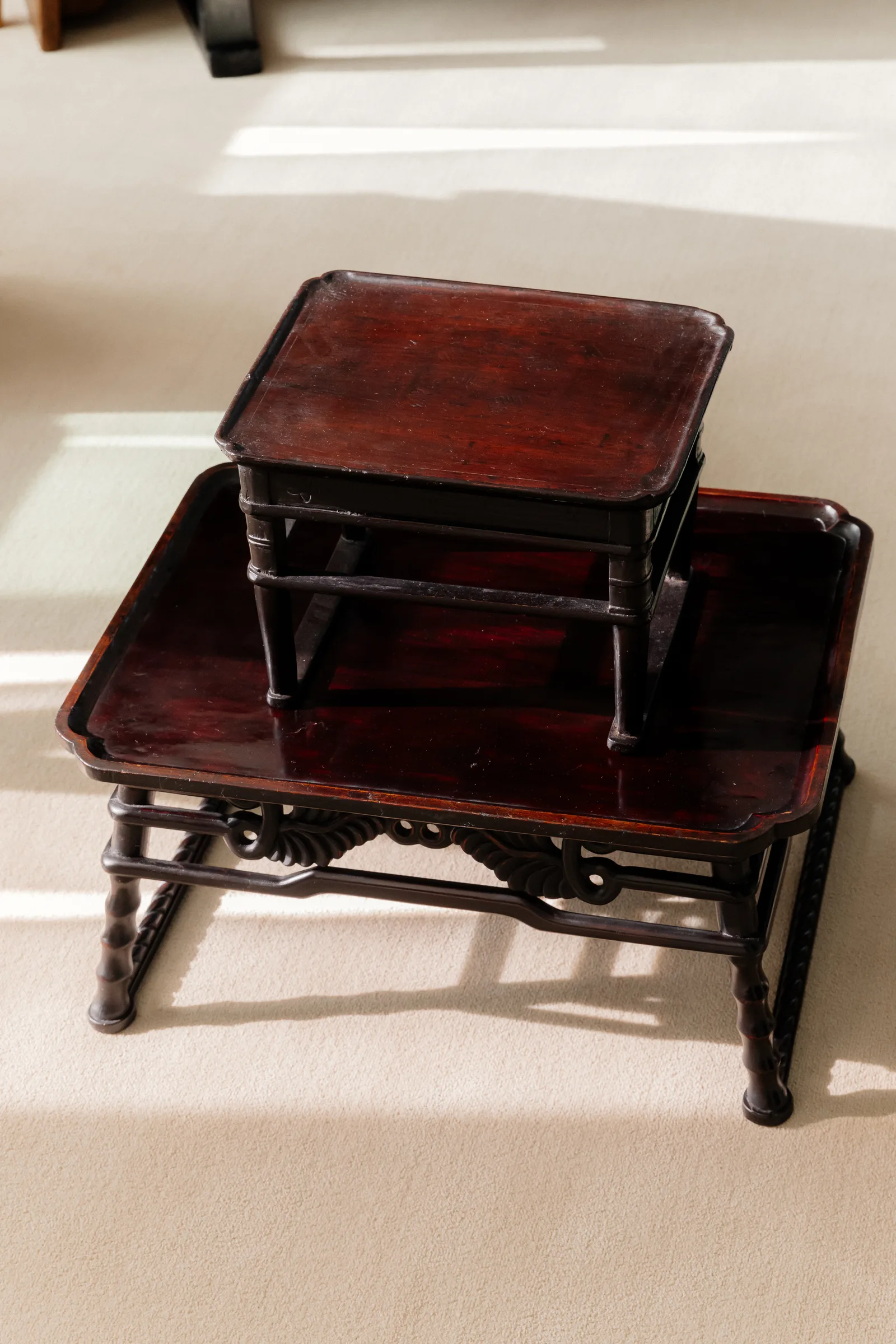 Red-lacquered soban tables stacked in use